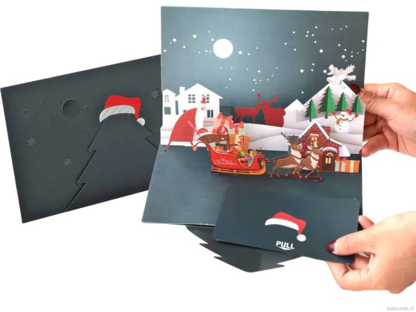 Popcards Pop-up-Karten Weihnachtskarte Weihnachtsmann Pferdeschlitten Weihnachtshäuser mit Hirsch und Schneemann Abend Nacht Stimmungsvoll beleuchtet Lichter 3D-Karte Grußkarte